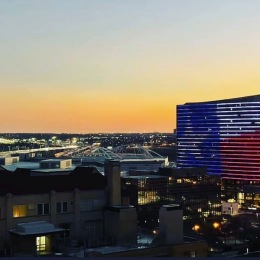 a city view with a sunset