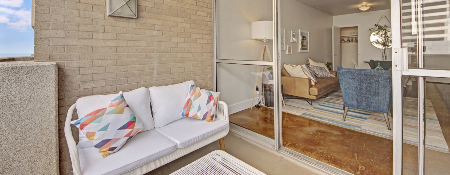 a balcony with a couch