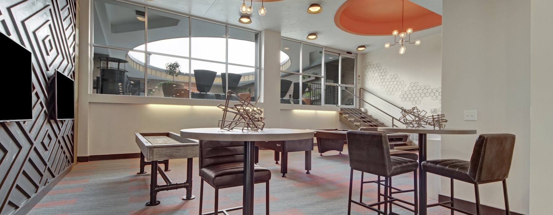 a room with tables and chairs